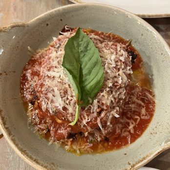 Made In Italy Bistro signature dishes Cacio e Pepe (prepared tableside in a Pecorino wheel)LasagnaGnocchi al Pesto